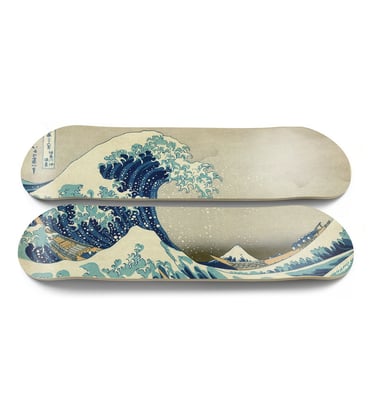 a pair of skateboard with a picture of a wave in the ocean
