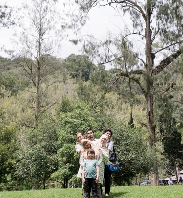 Natural family walk captured at Botanical Garden Bedugul Bali during an outdoor family session.