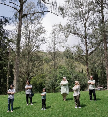 Iqbal family portrait in the open garden area of Bedugul during a family photography session.