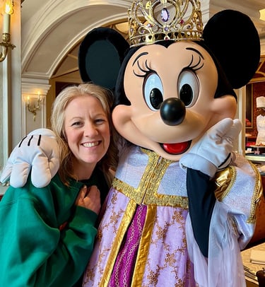 Leslie Hammer pictured with Minnie Mouse at Disneyland® Paris.