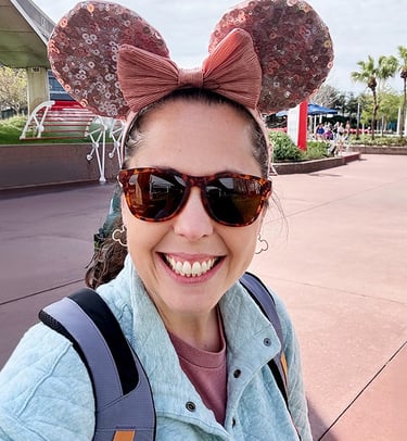 Jennifer Becker pictured inside EPCOT® at Walt Disney World®.
