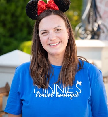 Kate Elliott pictured at Disney's Magic Kingdom® Park.