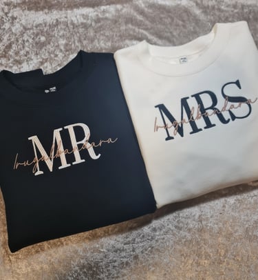 matching mr and mrs have been embroidered on these windcheaters sweatshirts
