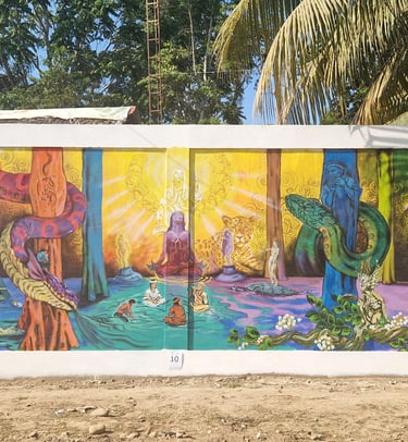 Vibrant spiritual mural featuring Amazonian ayahuasca symbolism, jaguars, and cosmic deities.