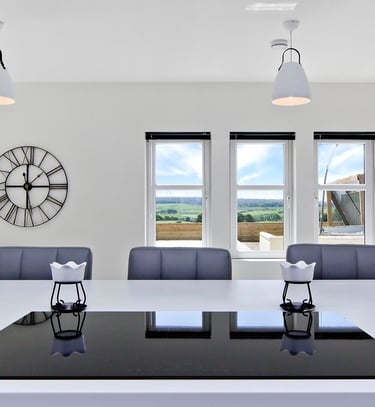 Modern kitchen design with integrated appliances  and a spacious island.