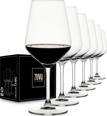 a row of wine glasses with wine glasses on them
