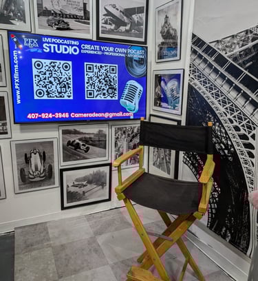Black and white travel photos surround a 50 inch TV that will display logos or video