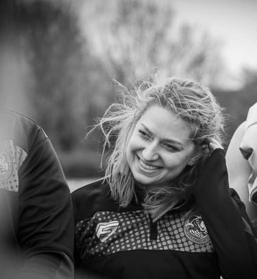 Fleur smiling post rugby match.
