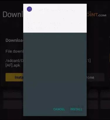 Android TV downloader app showing a pop-up dialog to install a downloaded APK file on a smart TV.