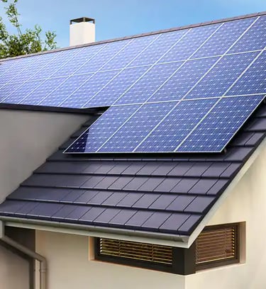 a house with solar panels installed on the roof