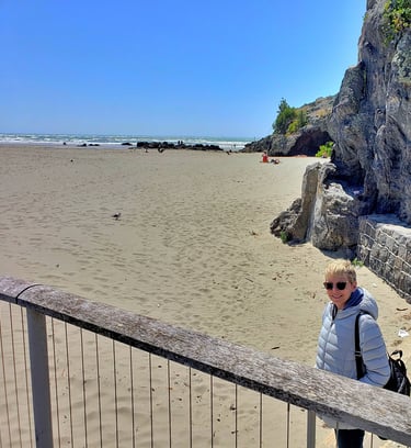 Lady Michelle enjoys a beautiful day at Sumner Beach in Christchurch, New Zealand