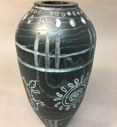 Hand carved black vase with gray markings