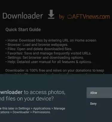 Permission prompt on a smart TV to allow the Downloader app access to photos, media, and files.