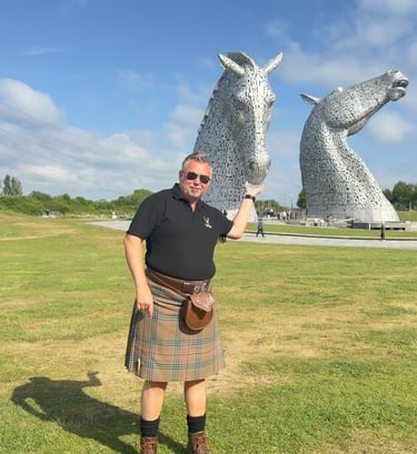 Lesley from Tour Guide Scotland at the Kelpies