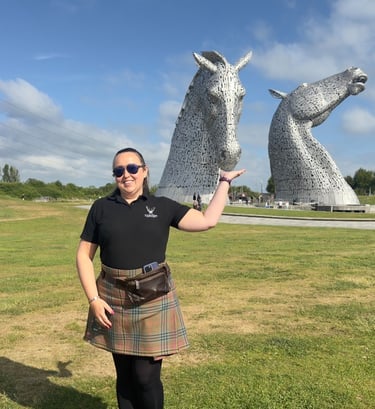 Lesley from Tour Guide Scotland at the Kelpies