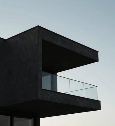 Conceptual architectural silhouette of a modern villa in Portugal, low angle looking up at a dark charcoal cantilever against a pale blue-grey sky, clean lines, minimalist aesthetic.