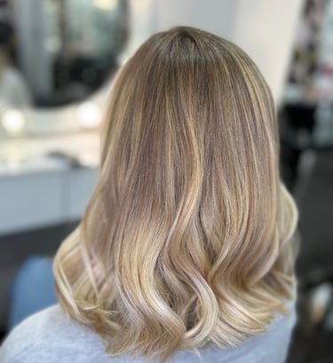 a woman with blonde hair and blonde hair