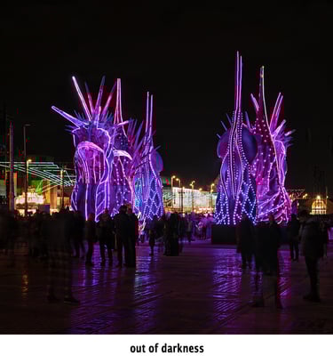 people at Blackpool illuminations after dark