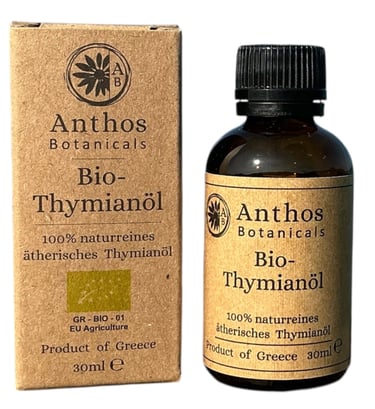 a bottle of thym oil with a box of thym