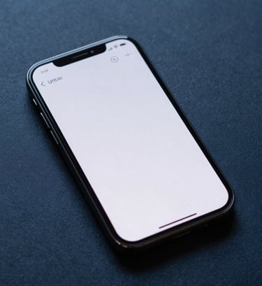 Close-up photography of a high-end smartphone displaying a minimalist user interface with clean typography, resting on a textured midnight blue surface under sophisticated studio lighting.