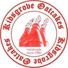 a red and white logo with a triangle shaped object