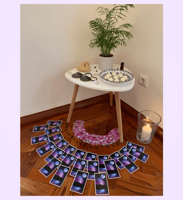 A table with offerings as a shrine during a yoga, reiki and yoga nidra workshop in Lisbon, Portugal.
