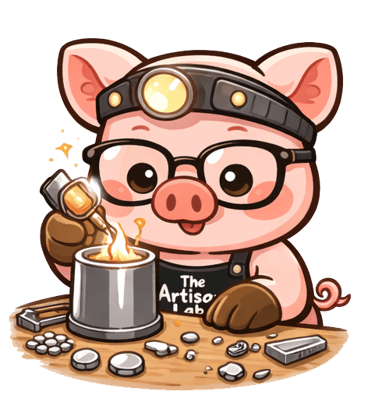 The Artisan Lab Designs mascot Milo is melting the silver with a torch