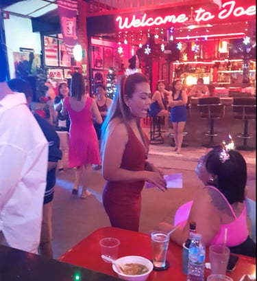 Thai women at party at bar, on Soi 80 in Hua Hin