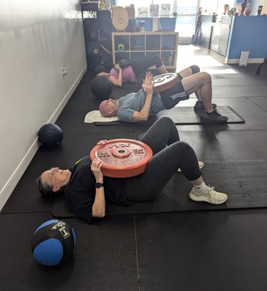 glute press with weighted plates