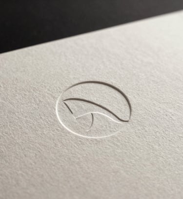 Macro photography of a minimalist logo embossed on premium off-white paper. Elegant shadows, shallow depth of field, sophisticated and professional atmosphere with a focus on tactile texture.