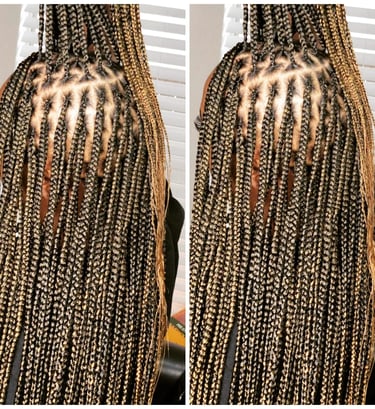 a woman with knotless braids hairstyle