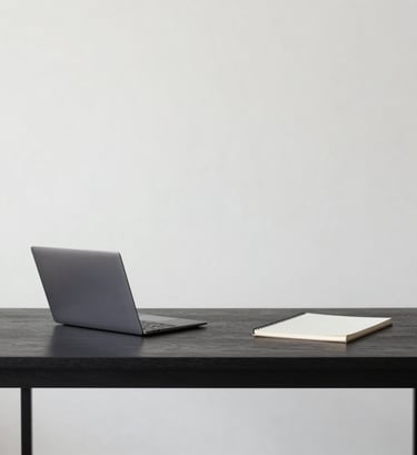 A wide-angle, minimalist photograph of a high-end design studio. A single dark wood desk holds a sleek laptop and a neutral sketchbook. The background is a clean, off-white wall with soft shadows. The overall vibe is professional and calm, with a palette dominated by #0F1E2E and #F8F8F4.