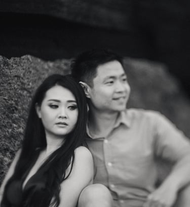 Black and white intimate couple portrait at Pantai Nyanyi Bali during sunset session.