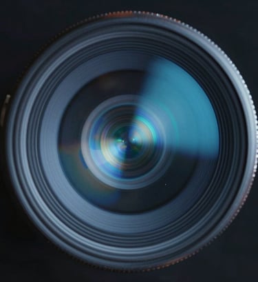 Abstract photography of light refraction on a lens, creating a tech-inspired glow with #E0FBFC and #3D5A80 colors, symbolizing digital innovation in art.