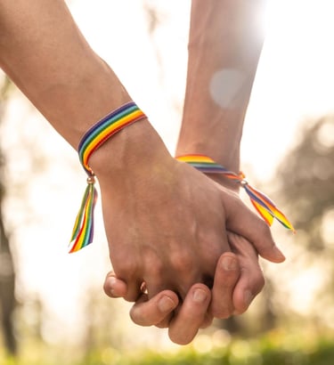 a couple holding hands while holding hands