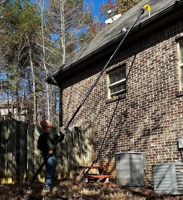 Residential gutter cleaning with gutter pro vac