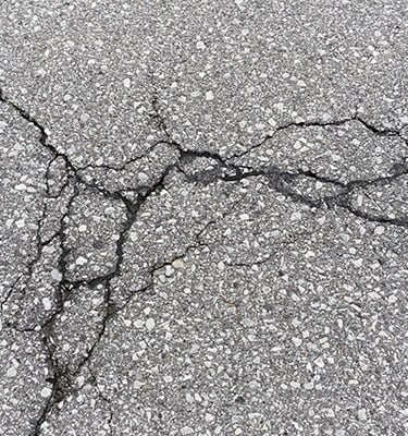 Asphalt crack before being repaired