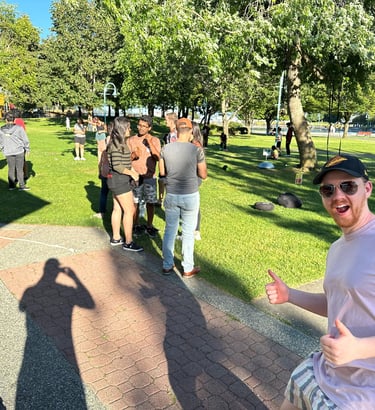 wellness park picture of people and a man smiling with a thumbs up