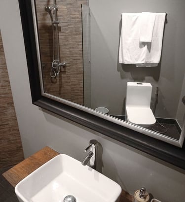 a bathroom sink with a mirror and a sink