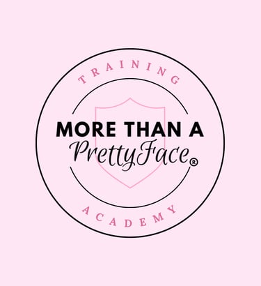 More Than A Pretty Face Training Academy circular logo with pink shield and black text on a light pink background.