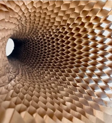 a honeycombed paper sculpture of a honeycombed flower