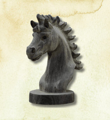 a wooden statue of a horse