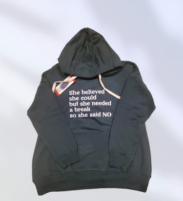 a black hoodie with a funny quote.
