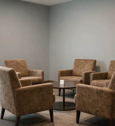 A warm and inviting professional meeting lounge in Indonesia, featuring comfortable chairs and pale mist grey walls.