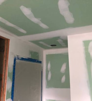 drywall taping in a bathroom