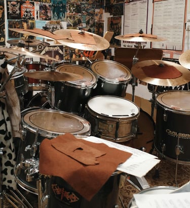 School black and brown drum sets