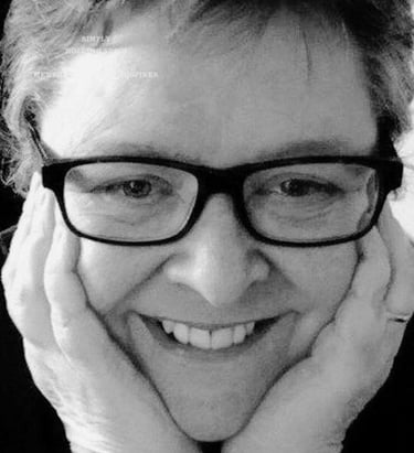 Nella D with head in hands