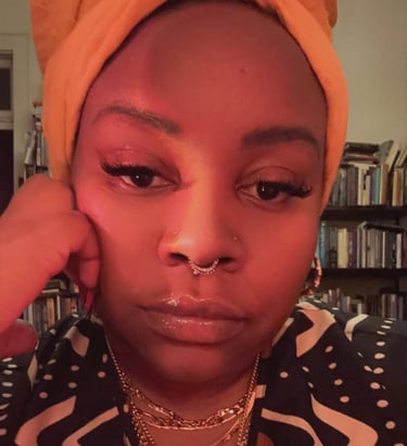 a woman with a yellow turban and a yellow headband