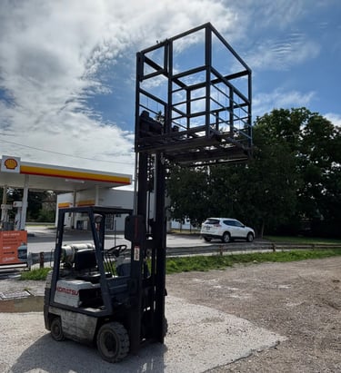 dcw budget 4x4 man basket work platform  being raised by fork lift