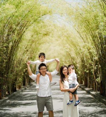 Playful family portrait during a natural family session at W Bali Seminyak